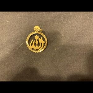 Gold pendants with Arabic writing